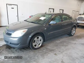 2007 Saturn Aura XE z VIN 1G8ZS57NX7F113634, wystawiony jako IAAI lot #42220503 z przebiegiem 102 611 mil mil oraz . Historia ofert i sprzedaży dostępna na DreamBid. Obrazek 2.