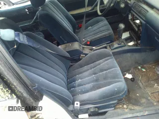 1991 Toyota Camry z VIN 4T1SV22E1MU450491, wystawiony jako IAAI lot #40356634 z przebiegiem 285 677 mil mil oraz . Historia ofert i sprzedaży dostępna na DreamBid. Obrazek 5.