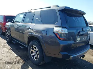 2021 Toyota 4Runner TRD Off Road Premium with VIN JTERU5JR0M5912797, listed as a IAAI auction lot 41796491 with 106,602 mi miles and . Bid and sale history available at DreamBid. Image 3.