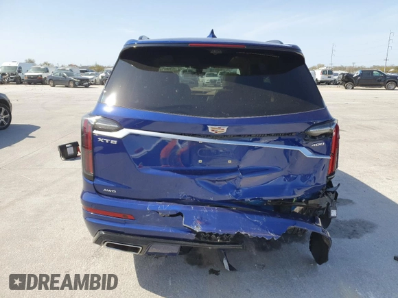 2023 Cadillac XT6 AWD Sport with VIN 1GYKPHRSXPZ117852, listed as a Copart auction lot 47895715 with 61,169 mi miles and Salvage title. Bid and sale history available at DreamBid. Image 6.