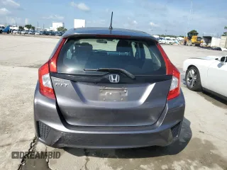 2015 Honda Fit LX с VIN 3HGGK5H59FM757797, выставлен на аукционе Copart как лот 58615175 с пробегом 109 608 миль миль и Списание • Salvage title. История ставок и продаж доступна на DreamBid. Изображение 6.