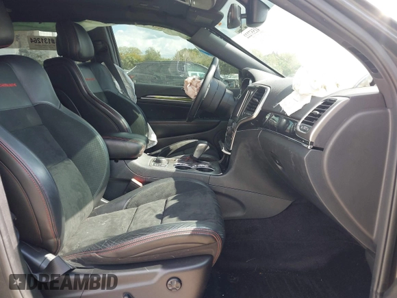2018 Jeep Grand Cherokee Trailhawk with VIN 1C4RJFLG8JC427345, listed as a IAAI auction lot 41557222 with 49,469 mi miles and . Bid and sale history available at DreamBid. Image 5.