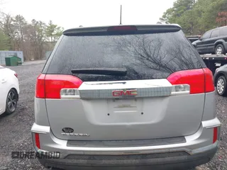 2016 GMC Terrain SLE with VIN 2GKALNEK9G6238700, listed as a IAAI auction lot 42013009 with 157,780 mi miles. Bid and sale history available at carsss.com. Image 16.