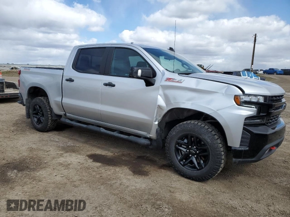 2021 Chevrolet Silverado 1500 LT Trail Boss with VIN 3GCPYFEL2MG130876, listed as a Copart auction lot 53039345 with 23,099 mi miles and Salvage Title. Bid and sale history available at DreamBid. Image 4.