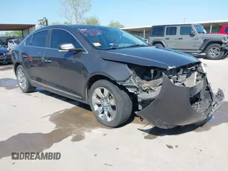 2013 Buick LaCrosse Premium 2 with VIN 1G4GH5E3XDF137436, listed as a IAAI auction lot 41988900 with 338,221 mi miles and . Bid and sale history available at DreamBid. Image 1.
