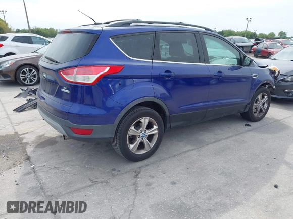 2013 Ford Escape SE with VIN 1FMCU0GXXDUB85818, listed as a IAAI auction lot 41848033 with 128,638 mi miles and . Bid and sale history available at DreamBid. Image 4.