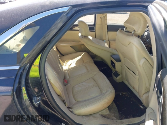 2014 Lincoln MKZ with VIN 3LN6L2G90ER801385, listed as a IAAI auction lot 41815173 with 155,579 mi miles and . Bid and sale history available at DreamBid. Image 8.