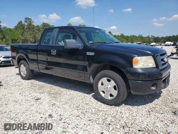 2007 Ford F-150 STX with VIN 1FTRX12W07FB12170, listed as a Copart auction lot 50452015 with 169,814 mi miles and Salvage title. Bid and sale history available at DreamBid. Image 4.