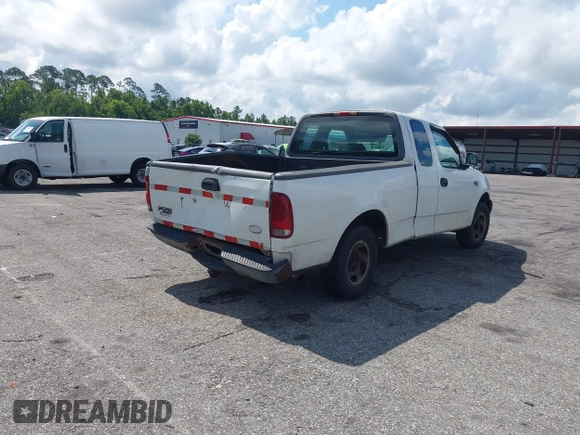 2001 Ford F-150 XL with VIN 1FTZX17241NA34480, listed as a IAAI auction lot 42613506 with 206,207 mi miles and . Bid and sale history available at DreamBid. Image 4.