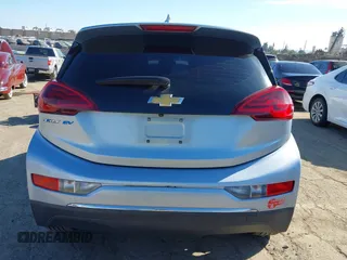 2017 Chevrolet Bolt EV LT z VIN 1G1FW6S02H4186534, wystawiony jako IAAI lot #41851755 z przebiegiem 129 483 mil mil oraz . Historia ofert i sprzedaży dostępna na DreamBid. Obrazek 17.