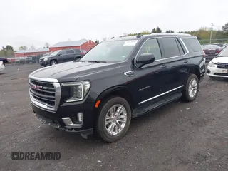 2024 GMC Yukon SLT with VIN 1GKS1BKD5RR209037, listed as a IAAI auction lot 41974006 with 36,918 mi miles. Bid and sale history available at carsss.com. Image 2.