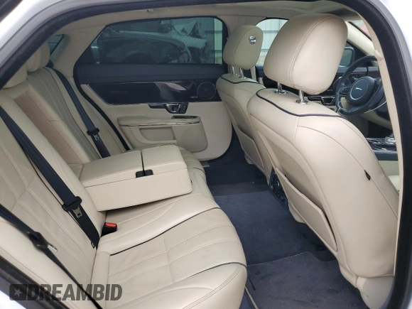 2014 Jaguar XJ Portfolio with VIN SAJWJ2GD6E8V65987, listed as a Copart auction lot 50091105 with 136,080 mi miles and Clean title. Bid and sale history available at DreamBid. Image 10.