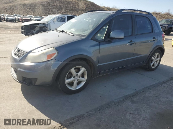 2009 Suzuki SX4 AWD z VIN JS2YB413895101919, wystawiony jako Copart lot #52235635 z przebiegiem 193 065 mil mil oraz Czysty tytuł • Clean title. Historia ofert i sprzedaży dostępna na DreamBid. Obrazek 1.