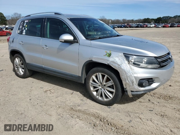 2012 Volkswagen Tiguan SE with VIN WVGAV7AX4CW520340, listed as a Copart auction lot 48210815 with 120,006 mi miles and Clean title. Bid and sale history available at DreamBid. Image 4.