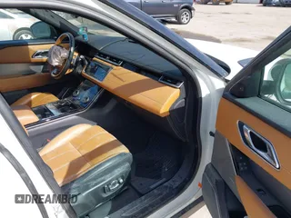 2018 Land Rover Range Rover Velar R-Dynamic SE z VIN SALYL2RV3JA743812, wystawiony jako IAAI lot #40842422 z przebiegiem 35 208 mil mil oraz . Historia ofert i sprzedaży dostępna na DreamBid. Obrazek 5.