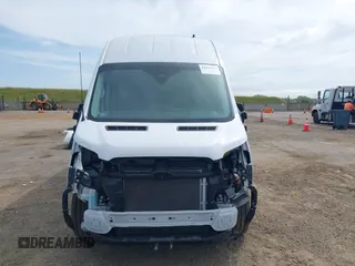 2022 Ford Transit Cargo with VIN 1FTBW3XG9NKA84214, listed as a IAAI auction lot 42033413 with 6,746 mi miles and . Bid and sale history available at DreamBid. Image 13.