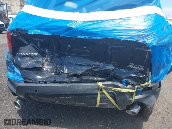 2023 Honda Passport Elite with VIN 5FNYF8H01PB030270, listed as a IAAI auction lot 42667744 with 7,931 mi miles and . Bid and sale history available at DreamBid. Image 6.