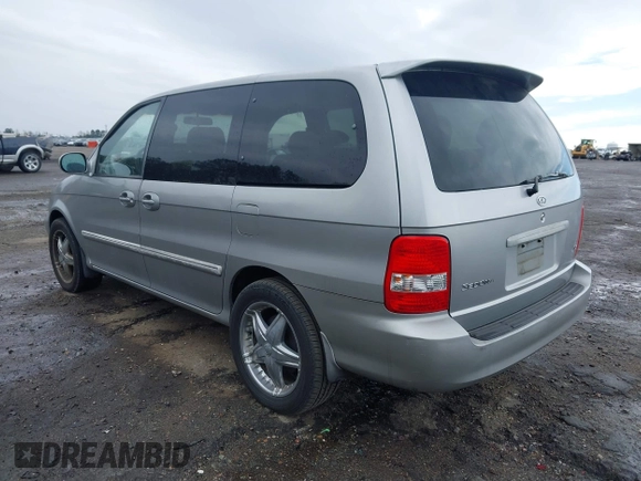 2004 Kia Sedona LX with VIN KNDUP131246567448, listed as a IAAI auction lot 41842992 with 231,424 mi miles. Bid and sale history available at carsss.com. Image 3.