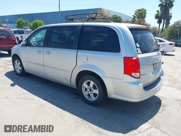 2012 Dodge Grand Caravan SXT with VIN 2C4RDGCG2CR223891, listed as a IAAI auction lot 42189650 with 119,669 mi miles and . Bid and sale history available at DreamBid. Image 3.