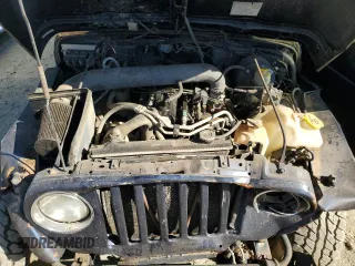 2005 Jeep Wrangler X z VIN 1J4FA39S75P374255, wystawiony jako Copart lot #51298675 z przebiegiem Nie podano mil oraz Szkoda całkowita • Salvage title. Historia ofert i sprzedaży dostępna na DreamBid. Obrazek 11.