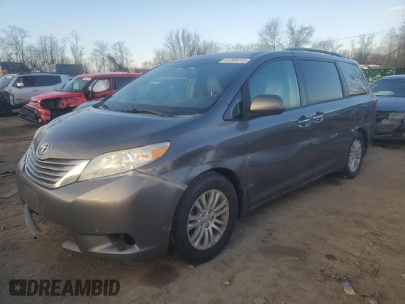 2015 Toyota Sienna XLE with VIN 5TDYK3DC2FS573393, listed as a Copart auction lot 41769415 with 329,692 mi miles and Salvage Title. Bid and sale history available at carsss.com. Image 1.