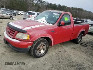 2000 Ford F-150 XL with VIN 2FTZF1726YCA76913, listed as a Copart auction lot 41915355 with 210,573 mi miles and Clean title. Bid and sale history available at DreamBid. Image 1.