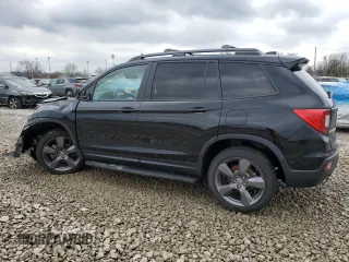 2021 Honda Passport Touring z VIN 5FNYF8H91MB009476, wystawiony jako Copart lot #52449015 z przebiegiem 42 848 mil mil oraz Szkoda całkowita • Salvage title. Historia ofert i sprzedaży dostępna na DreamBid. Obrazek 2.