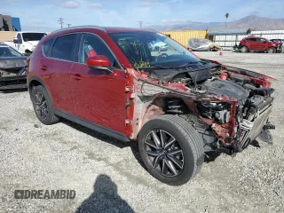 2018 Mazda CX-5 Touring with VIN JM3KFACM6J0334327, listed as a Copart auction lot 47863595 with 68,070 mi miles and Salvage Title. Bid and sale history available at carsss.com. Image 4.