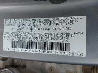 2015 Toyota Tacoma z VIN 3TMLU4ENXFM206669, wystawiony jako IAAI lot #41323365 z przebiegiem 102 297 mil mil oraz . Historia ofert i sprzedaży dostępna na DreamBid. Obrazek 9.