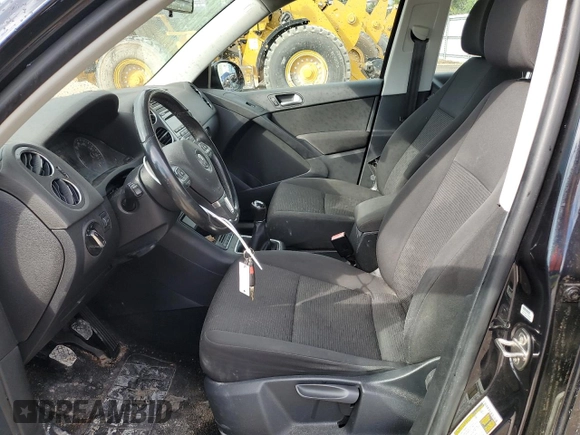 2014 Volkswagen Tiguan with VIN WVGCV3AX4EW526613, listed as a Copart auction lot 73949784 with 83,421 mi miles and Salvage Title. Bid and sale history available at DreamBid. Image 7.