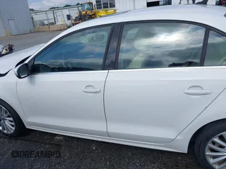 2016 Volkswagen Jetta SEL z VIN 3VWL07AJ0GM376263, wystawiony jako IAAI lot #42728100 z przebiegiem 213 315 mil mil oraz . Historia ofert i sprzedaży dostępna na DreamBid. Obrazek 14.