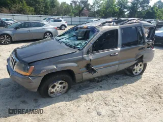 1999 Jeep Grand Cherokee Laredo with VIN 1J4G258S9XC758711, listed as a Copart auction lot 58420835 with Not provided miles and Salvage title. Bid and sale history available at DreamBid. Image 1.
