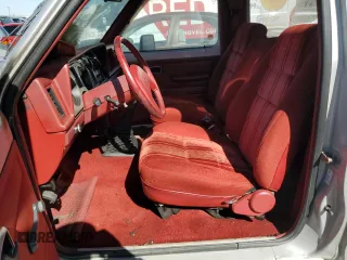 1988 Ford Bronco z VIN 1FMCU14T2JUA39593, wystawiony jako Copart lot #76556764 z przebiegiem Nie podano mil oraz Szkoda całkowita • Salvage title. Historia ofert i sprzedaży dostępna na DreamBid. Obrazek 7.