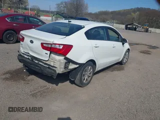2014 Kia Rio LX with VIN KNADM4A37E6332282, listed as a IAAI auction lot 42050166 with 159,116 mi miles. Bid and sale history available at carsss.com. Image 4.