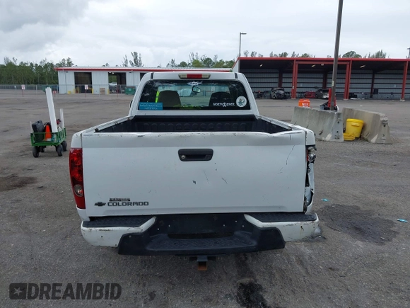 2009 Chevrolet Colorado Work Truck z VIN 1GCCS199798133352, wystawiony jako IAAI lot #42178500 z przebiegiem 166 648 mil mil oraz . Historia ofert i sprzedaży dostępna na DreamBid. Obrazek 16.