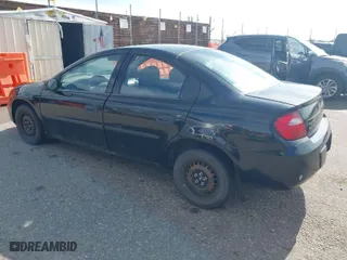 2004 Dodge Neon SE with VIN 1B3ES26C14D557254, listed as a IAAI auction lot 41906730 with 235,092 mi miles. Bid and sale history available at carsss.com. Image 3.