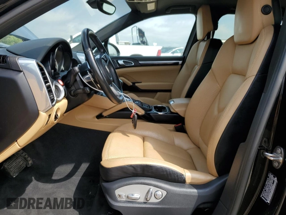 2018 Porsche Cayenne with VIN WP1AA2A27JKA04421, listed as a Copart auction lot 49601795 with 57,295 mi miles and Salvage title. Bid and sale history available at DreamBid. Image 7.