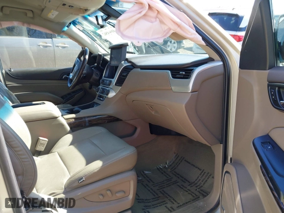 2016 GMC Yukon XL SLE with VIN 1GKS2FKC9GR458451, listed as a IAAI auction lot 41664562 with 196,400 mi miles. Bid and sale history available at carsss.com. Image 5.