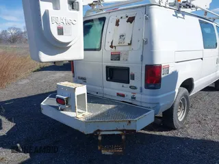 2012 Ford Econoline Cargo Super Duty Commercial with VIN 1FTSE3EL5CDB22042, listed as a IAAI auction lot 41950506 with 157,363 mi miles. Bid and sale history available at carsss.com. Image 6.