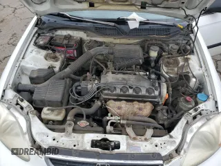 1997 Honda Civic LX z VIN JHMEJ6575VS021562, wystawiony jako Copart lot #54743805 z przebiegiem 133 886 mil mil oraz Szkoda całkowita • Salvage title. Historia ofert i sprzedaży dostępna na DreamBid. Obrazek 11.