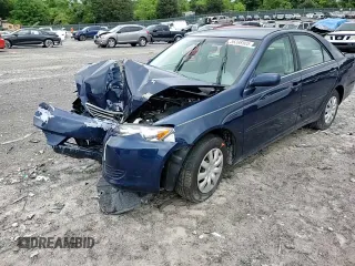 2005 Toyota Camry LE z VIN 4T1BE30K95U072730, wystawiony jako Copart lot #56398505 z przebiegiem 115 917 mil mil oraz Czysty tytuł • Clean title. Historia ofert i sprzedaży dostępna na DreamBid. Obrazek 14.
