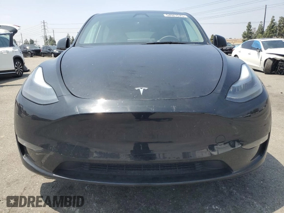 2024 Tesla Model Y Long Range with VIN 7SAYGDEE4RA228916, listed as a Copart auction lot 54921575 with 13,607 mi miles and Salvage title. Bid and sale history available at DreamBid. Image 5.
