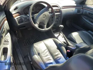 2000 Toyota Solara SE z VIN 2T1CF28P8YC296590, wystawiony jako Copart lot #49839935 z przebiegiem 192 140 mil mil oraz Czysty tytuł • Clean title. Historia ofert i sprzedaży dostępna na DreamBid. Obrazek 8.