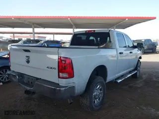 2014 Ram 2500 Tradesman with VIN 3C6TR5CT5EG303307, listed as a IAAI auction lot 41725435 with 154,746 mi miles. Bid and sale history available at carsss.com. Image 4.