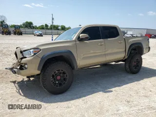 2019 Toyota Tacoma SR5 with VIN 3TMAZ5CN2KM093098, listed as a Copart auction lot 56254195 with 90,127 mi miles and Salvage title. Bid and sale history available at DreamBid. Image 1.