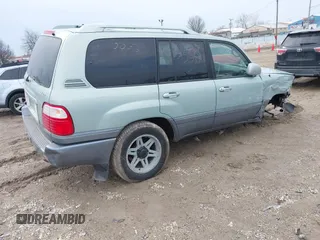 2004 Lexus LX 470 z VIN JTJHT00W143546192, wystawiony jako IAAI lot #41673810 z przebiegiem 232 196 mil mil oraz . Historia ofert i sprzedaży dostępna na DreamBid. Obrazek 4.