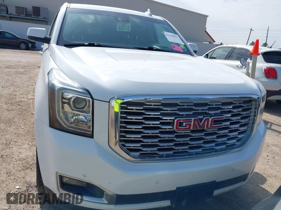 2019 GMC Yukon XL Denali with VIN 1GKS1HKJ8KR378385, listed as a IAAI auction lot 41580041 with 115,481 mi miles. Bid and sale history available at carsss.com. Image 12.
