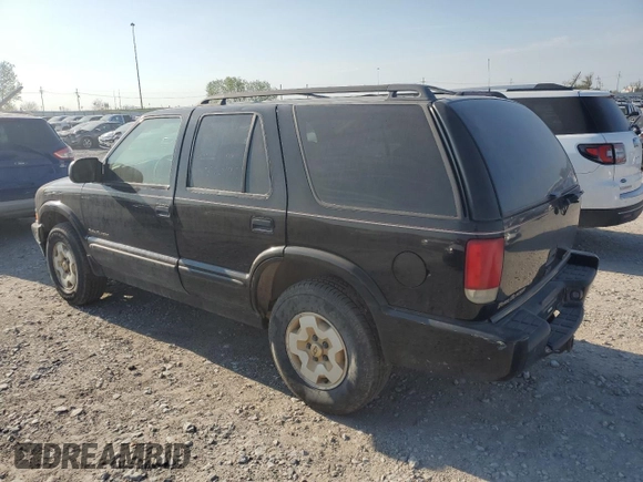 1999 Chevrolet Blazer Trailblazer z VIN 1GNDT13W2X2130625, wystawiony jako Copart lot #50596885 z przebiegiem 187 444 mil mil oraz Czysty tytuł • Clean title. Historia ofert i sprzedaży dostępna na DreamBid. Obrazek 2.