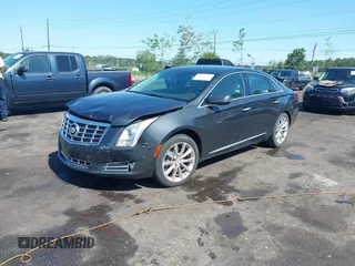 2014 Cadillac XTS Luxury z VIN 2G61M5S37E9211547, wystawiony jako IAAI lot #42373128 z przebiegiem 146 354 mil mil oraz . Historia ofert i sprzedaży dostępna na DreamBid. Obrazek 17.