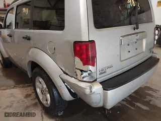 2007 Dodge Nitro SLT with VIN 1D8GU58K97W616455, listed as a IAAI auction lot 41229813 with 199,421 mi miles. Bid and sale history available at carsss.com. Image 6.